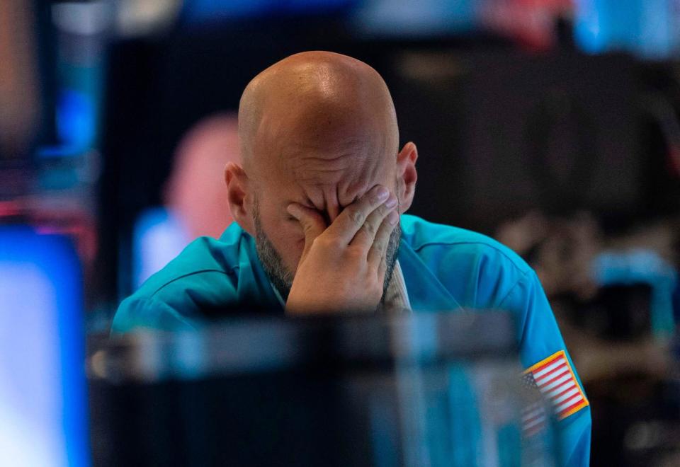 Image of trader crying