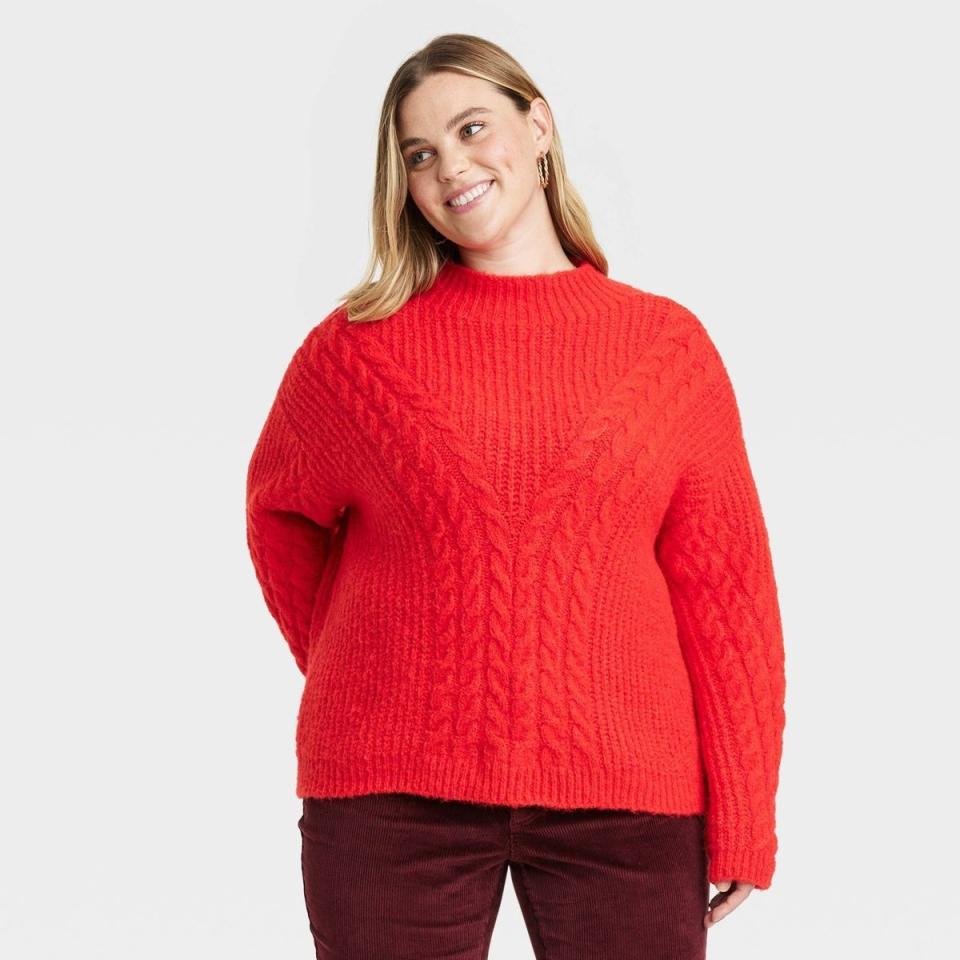 model wearing the red sweater