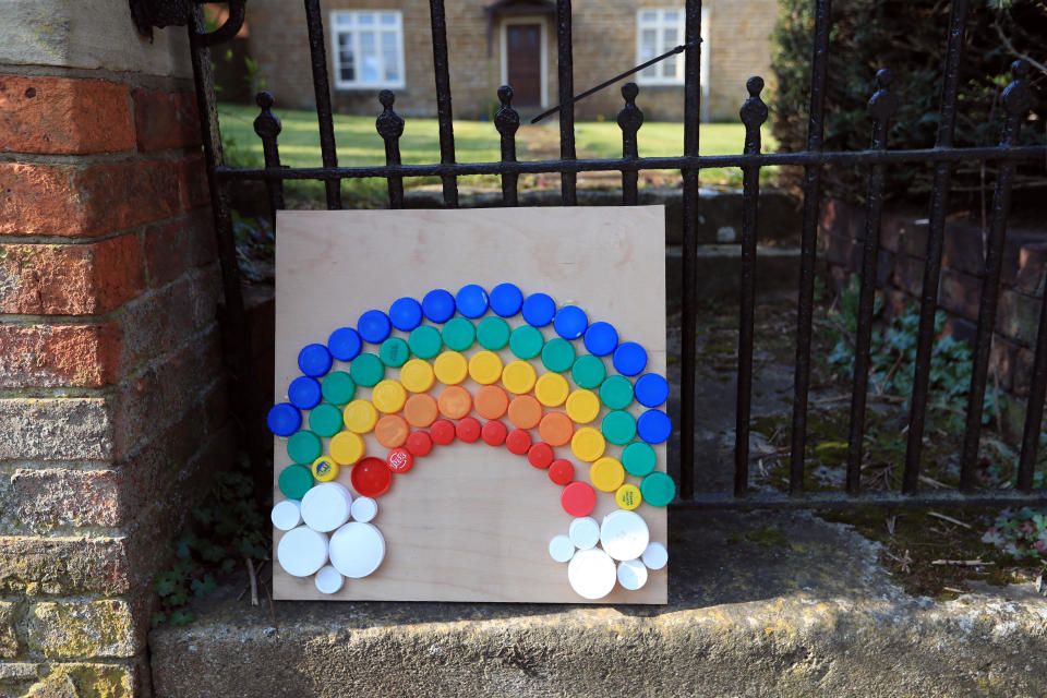 File photo dated 27/03/20 of a rainbow made from bottle caps in Muston, Leicestershire, as the UK continues in lockdown to help curb the spread of the coronavirus. Queen Elizabeth II gave a televised message to the nation during the coronavirus outbreak.