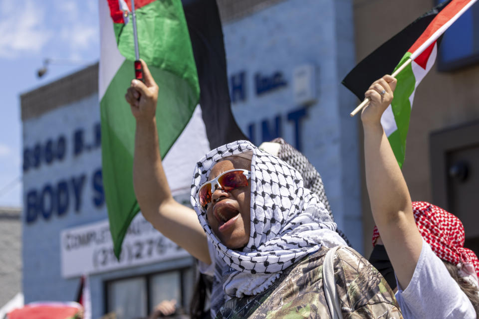 A Pro- Palestinian protester shout slogans near Adas Torah synagogue Sunday, June 23, 2024 in Los Angeles. President Joe Biden has denounced violence that flared when opponents of the Israel-Hamas war in Gaza staged a protest at a Los Angeles synagogue during the weekend. (Zoe Cranfill / Los Angeles Times via AP)