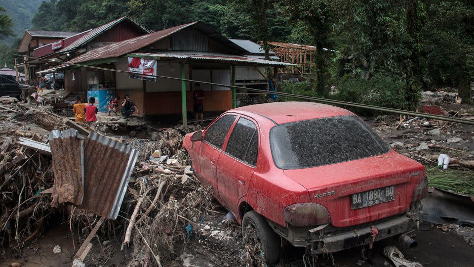 Strong mudslides wrecked devastation on many districts, including this village. - Rezan Soleh/AFP/Getty Images
