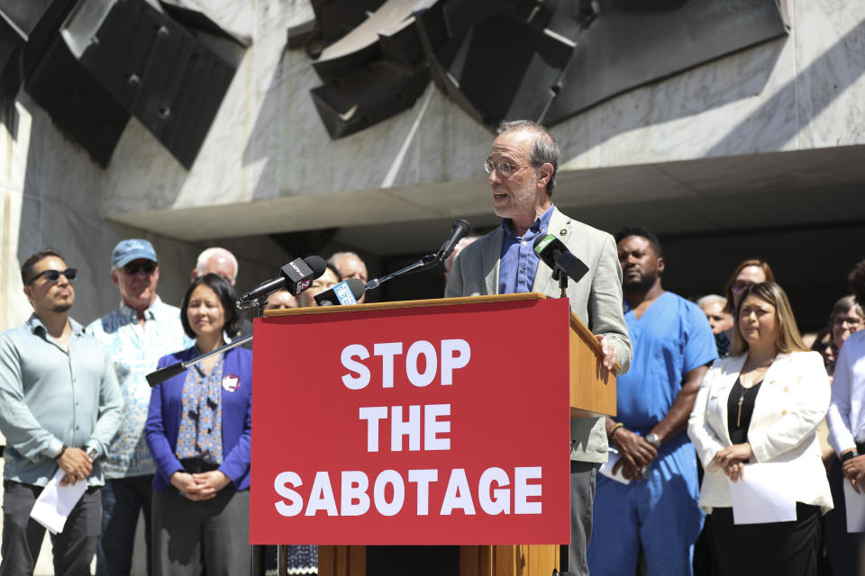 Democratic Sen. Michael Dembrow speaks during a press conference and rally against the Republican Senate walkout at the Oregon State Capitol in Salem, Ore., Tuesday, June 6, 2023. Oregon Democratic lawmakers got on the state Capitol steps Tuesday and implored Republican senators, who have been boycotting the Senate for over a month, to return and vote on bills, saying lives are literally at stake. (AP Photo/Amanda Loman)