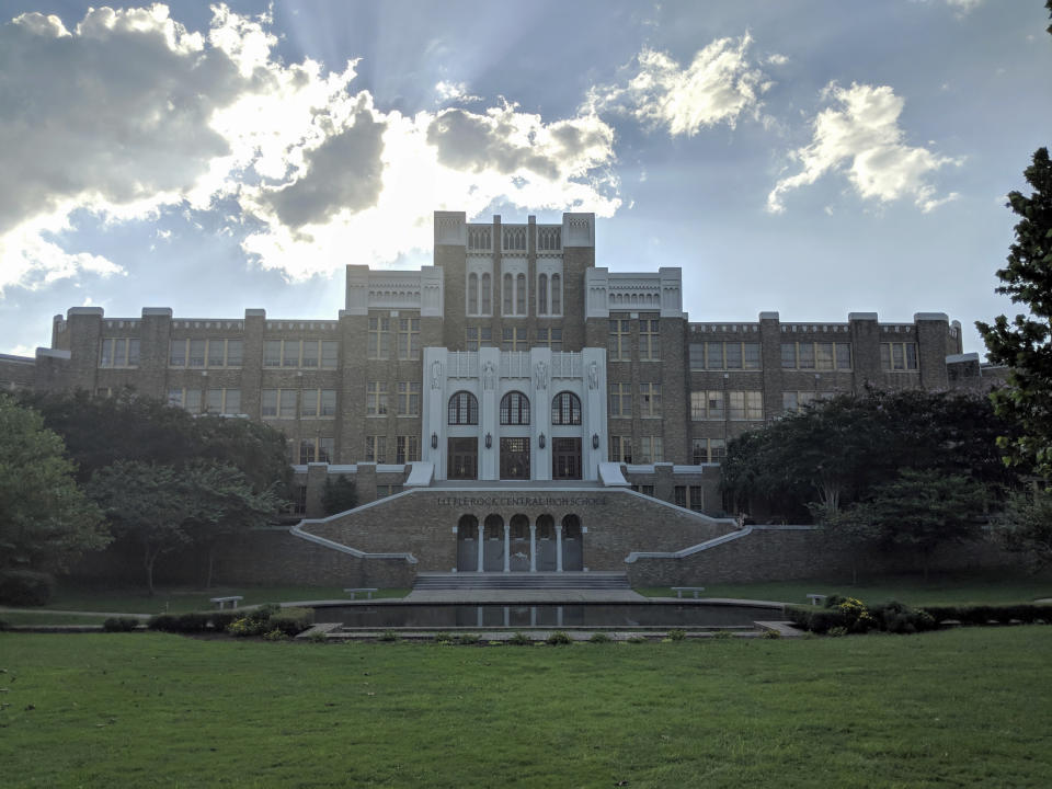 Central High School, the setting of a contentious desegregation effort in 1957 by Elizabeth Eckford and eight other black students known as the Little Rock Nine, is seen on Tuesday, Sept. 4, 2018, in Little Rock, Ark. Eckford returned to the school 61 years to the day after she was blocked from entering by the Arkansas National Guard and white protesters to dedicate a commemorative reconstructed bench on which she originally sat. Current Central high students led the bench construction effort as part of the Central High Civil Rights Memory Project. (AP Photo/Hannah Grabenstein)