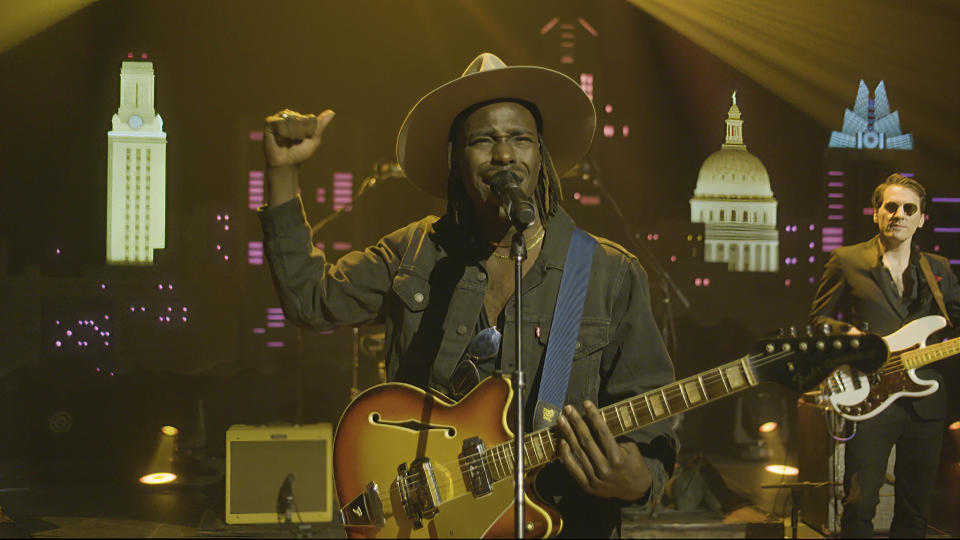 In this image from video, Eric Burton, left, and Adrian Quesada, right, of Black Pumas, perform during the Celebrating America event on Wednesday, Jan. 20, 2021, following the inauguration of Joe Biden as the 46th president of the United States. (Biden Inaugural Committee via AP)