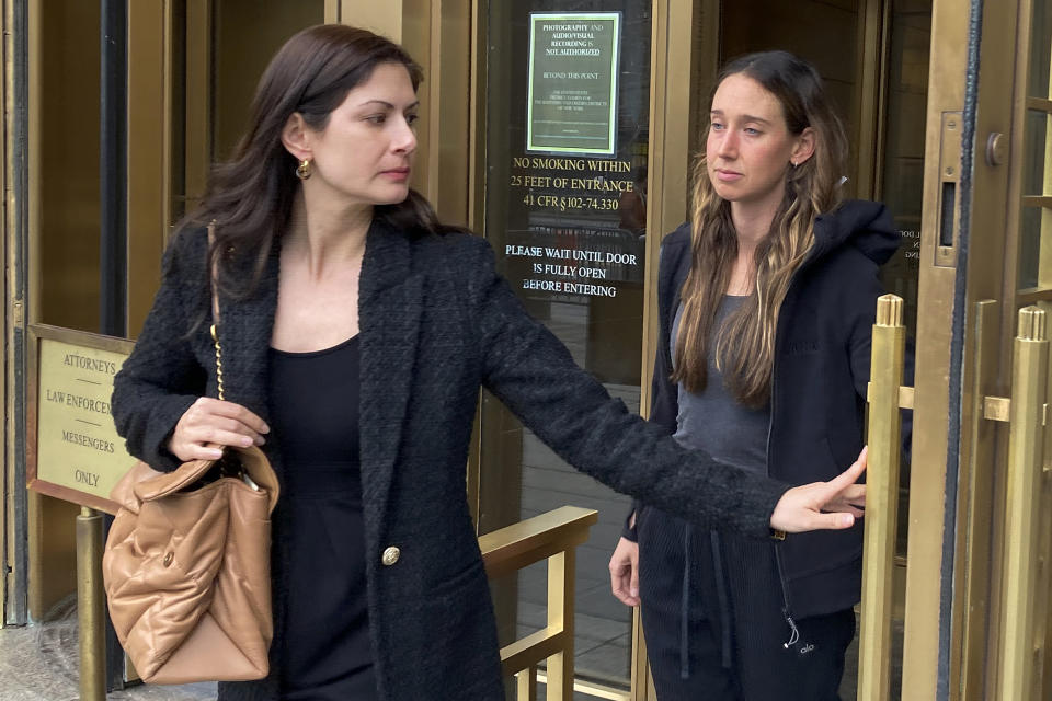 Charlie Javice, of Miami Beach, Fla., right, leaves Manhattan federal court with her attorney Marren Shah, Tuesday, April 4, 2023, in New York. On Monday, May 22, 2023, Javice pleaded not guilty to an indictment returned late last week in Manhattan federal court. The 31-year-old Miami Beach, Fla., resident entered the plea through her lawyer during a remote proceeding. on charges that she duped J.P. Morgan Chase with fake records to acquire Frank, her student loan assistance startup company, for $175-million. Prosecutors say she claimed her company had over 4 million customers when it had fewer than 300,000 clients. (AP Photo/Lawrence Neumeister)