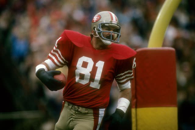 <p>Focus on Sport/Getty </p> Russ Francis #81 of the San Francisco 49ers in action during an NFL football game at Candlestick Park circa 1983 in San Francisco, California. Francis played for the 49ers from 1982-87