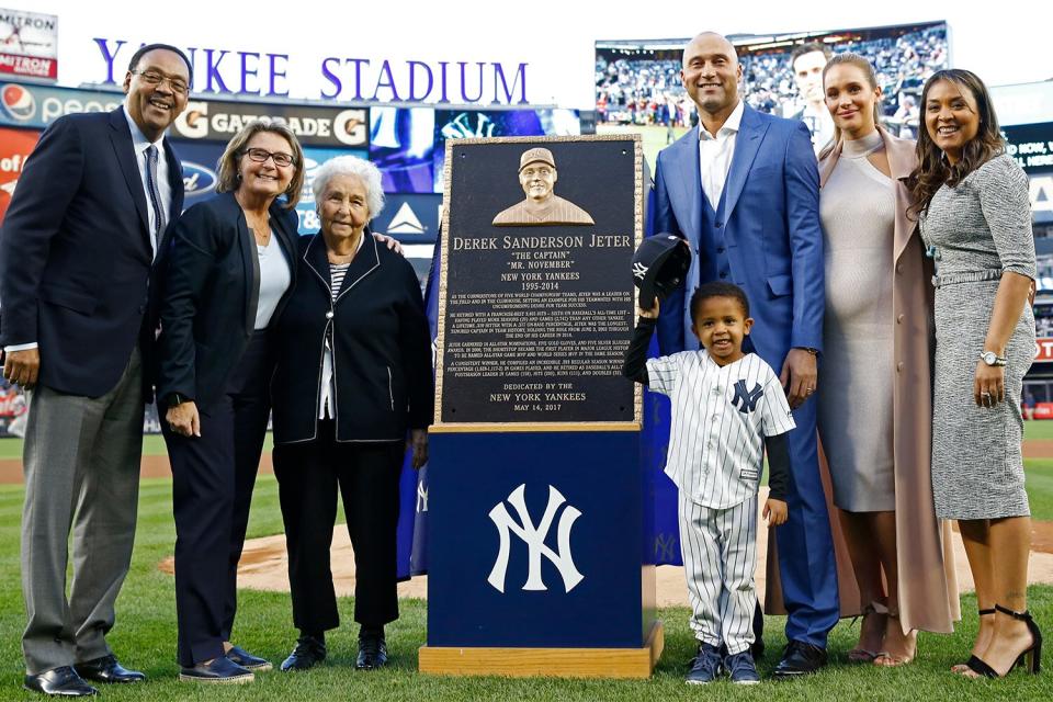 Mandatory Credit: Photo by AP/Shutterstock (8820989at) Derek Jeter, Hannah Jeter Retired New York Yankees shortstop Derek Jeter, third from right, poses with his family and the monument that will represent him in Yankee Stadium's Monument Park during an on-field, pregame, ceremony retiring Jeter's number 2 in New York, . From left are Jeter's parents Charles and Dorothy Jeter, his grandmother "Dot" Jeter, Jeter's nephew Jaden, his wife Hannah Jeter and sister Sharlee Jeter Yankees Jeter, New York, USA - 14 May 2017