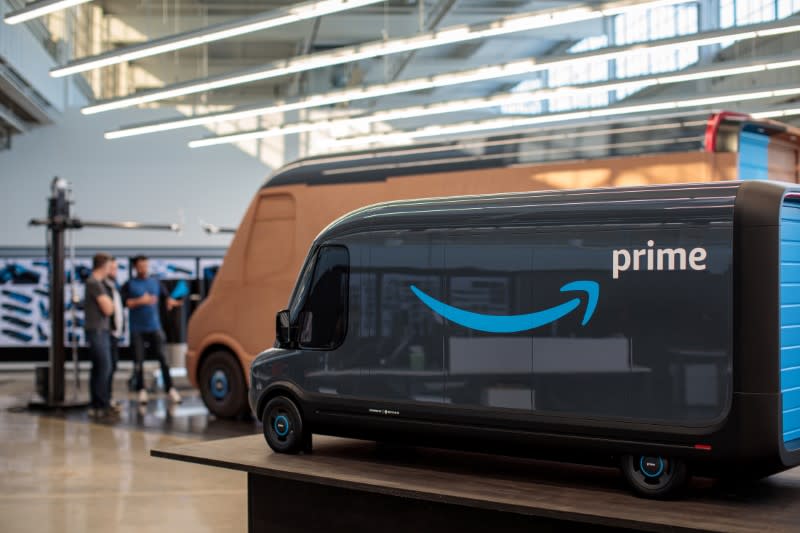 Models of the Rivian-built Amazon electric delivery vans are seen in this handout photo in Plymouth