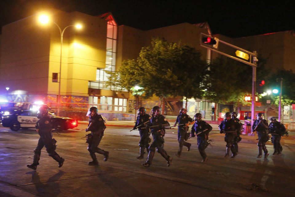 <p>Riot police respond to anti-Trump protests at the Albuquerque Convention Center following a rally and speech by Republican presidential candidate Donald Trump in Albuquerque, N.M., Tuesday, May 24, 2016. (AP Photo/Brennan Linsley) </p>