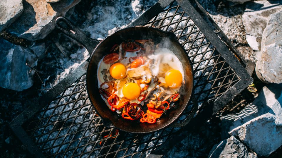 Eggs are cooked in a cast-iron skillet. Cast iron is naturally nonstick and can handle the heat evenly. - AegeanBlue/E+/Getty Images