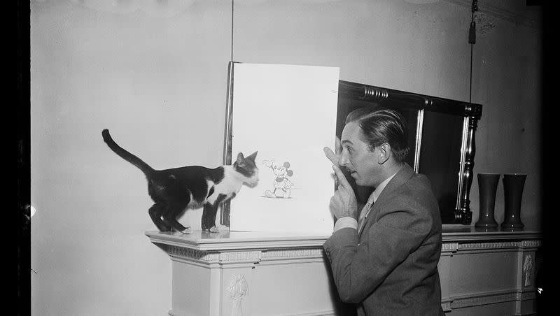 Walt Disney with a Mickey Mouse drawing from 1931.