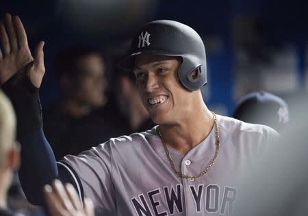 Baseball: Yankees new Murderers' Row hammer Blue Jays in opener