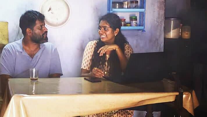 Jeo Baby with Nimisha Sajayan share a laugh while shooting for <i>The Great Indian Kitchen.</i>