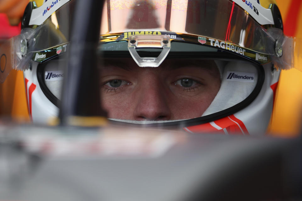 Red Bull driver Max Verstappen of Netherlands sits in his car in pit lane during a practice session ahead of the Australian Formula One Grand Prix at Albert Park in Melbourne, Saturday, April 1, 2023. (AP Photo/Asanka Brendon Ratnayake)