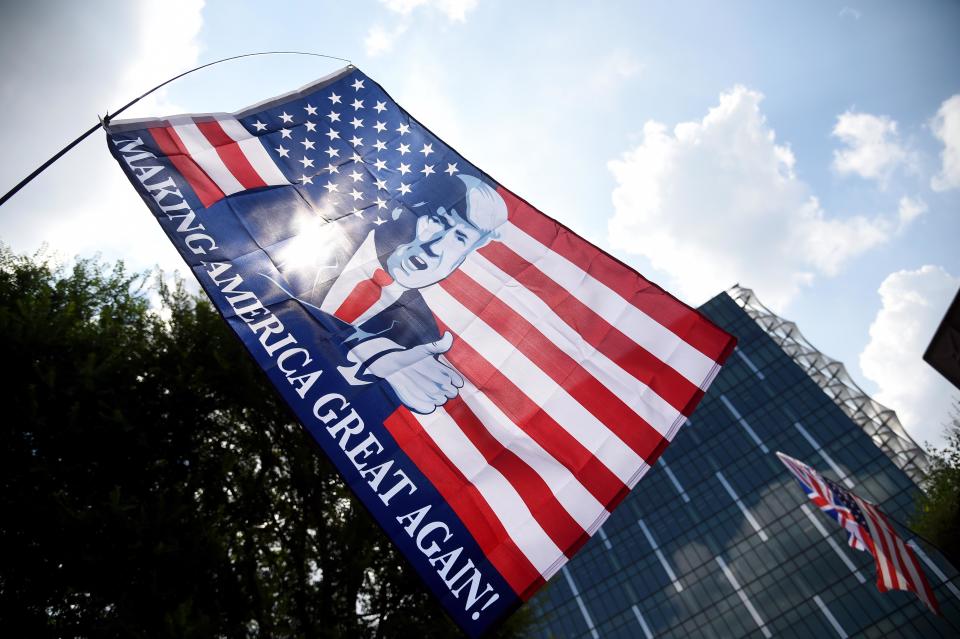 <p>A Trump flag flies during a pro-Trump Rally in front of the U.S. Embassy in London on July 14, 2018. (Photo: Finbarr Webster/REX/Shutterstock) </p>