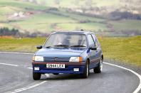 <p>Amidst a generation of Porsche 928s and Jaguar XJR-S, the 205 GTi would still be classed by people today as one of the top cars of the 1980s. A tuned engine in a lightweight package with understated bodywork resulted in large success. In 1984, the 205 GTi was powered by a 1.6-litre 103bhp powerplant but just two years later in 1986, the 1.6-litre was revised and the power was upped to 113bhp. </p><p>In the same year, the winning 1.9-litre GTi was launched with a punchy 128bhp. Because of its 875kg weight, 0-62mph was dealt with in just under 8sec and 127mph was achievable. Its finely tuned chassis allowed it to duck and dive around corners and even entice lift-off oversteer on some occasions. The 205 GTi was a perfect reminder that you didn’t need a lot of visual aero to have fun, whichever side of the 1.6 v 1.9 debate you’re on.</p>