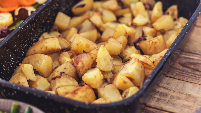 Roast potatoes in pan