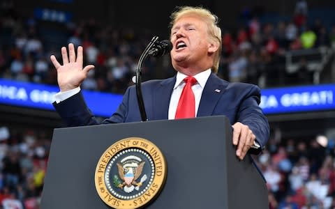 Donald Trump addressing a crowd of supporters in Kentucky this week - Credit: MANDEL NGAN/AFP via Getty Images