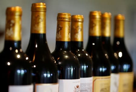 FILE PHOTO: Bottles of French red wine are displayed at the Chateau du Pavillon in Sainte-Croix-Du-Mont,