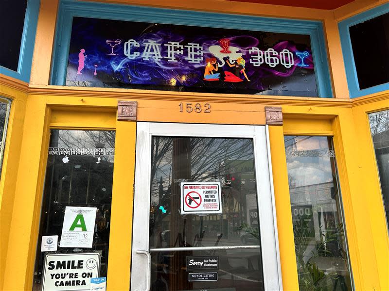 A sign on the door of Louisville's Cafe 360 bar warns attendees that guns and other weapons are not allowed on the property. March 4, 2024