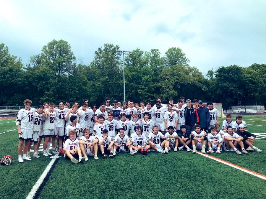 The Mountain Lakes boys lacrosse team poses for photos after beating Glen Rock in the North Group 1 final. May 28, 2022.