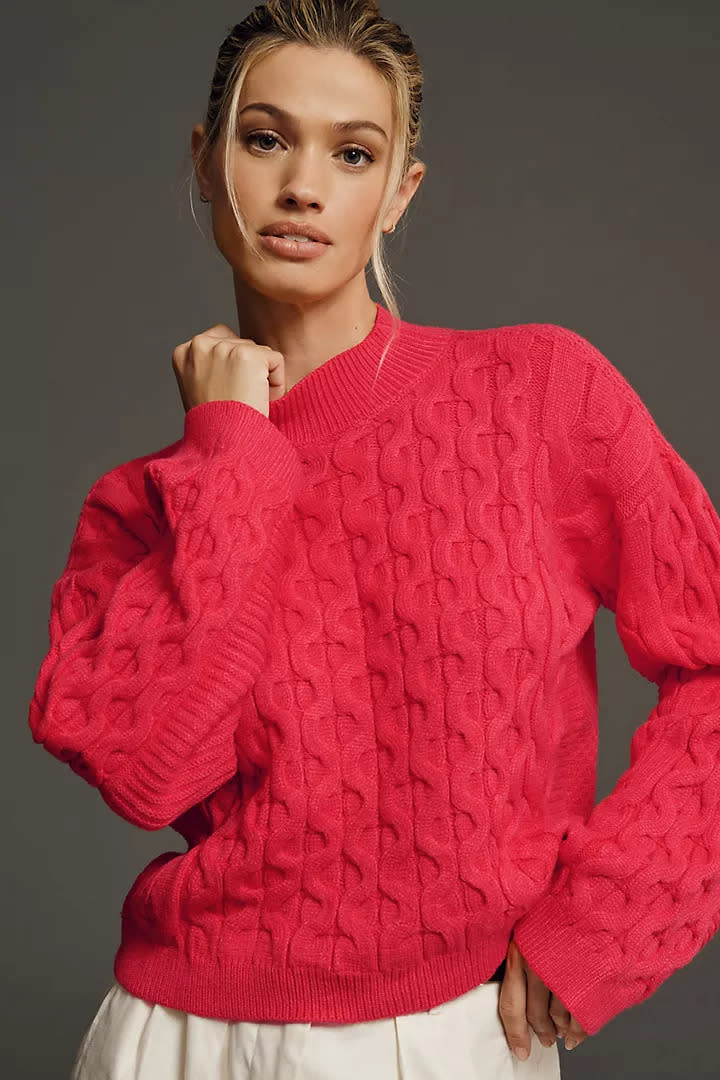 4SI3NNA Long-Sleeve Cropped Cable Sweater. Image via Anthropologie.