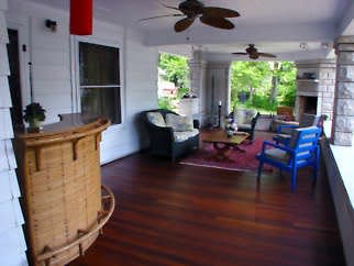 A long view of the Mease/Metelnick porch, complete with vintage tiki bar. Photo by Carrol Krause