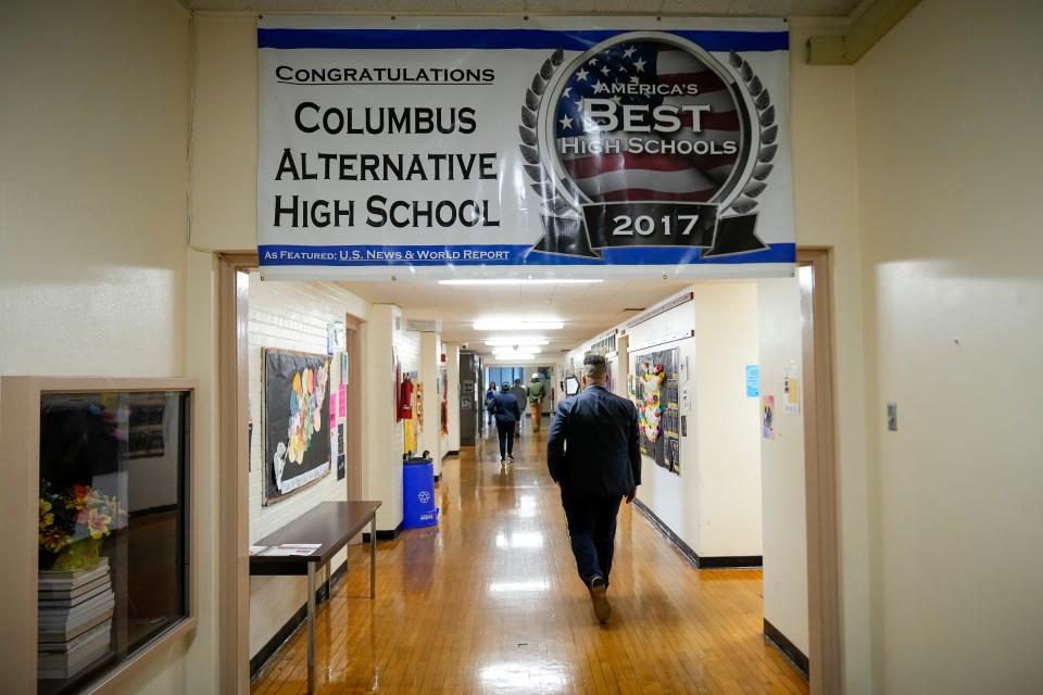 Columbus City school board member Brandon Simmons, a 2020 graduate of Columbus Alternative High School, leads a tour Tuesday of the aging school building. The school was included on a proposed list of potential closures for the district by the Superintendent's Community Facilities Task Force.
