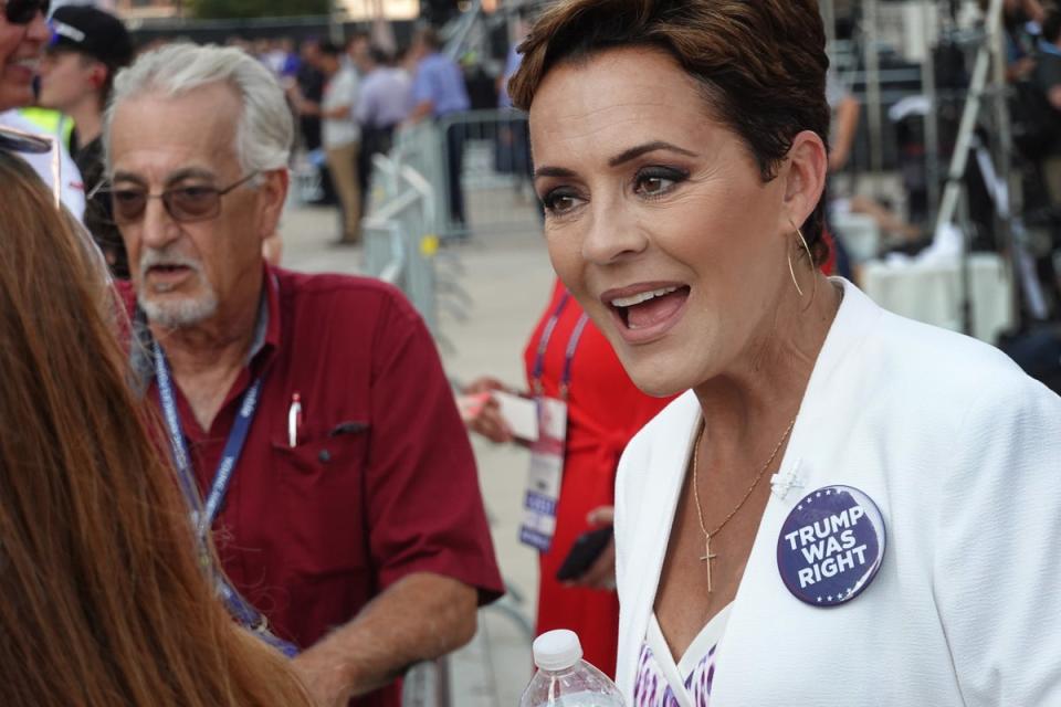 Former Arizona gubernatorial candidate and supporter of former President Donald Trump Kari Lake greets people outside of the Fiserv Forum before the start of the first GOP presidential debate on August 23, 2023 in Milwaukee, Wisconsin. (Getty Images)