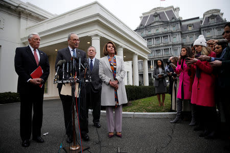 Senate Democratic leader Chuck Schumer (D-NY) talks with reporters, accompanied by House Democratic leader Nancy Pelosi (D-CA); Rep. Steny Hoyer (D-MD) and Sen. Dick Durnin (D-IL), following a border security briefing with U.S. President Donald Trump and congressional leadership at the White House in Washington, U.S., January 2, 2019. REUTERS/Carlos Barria