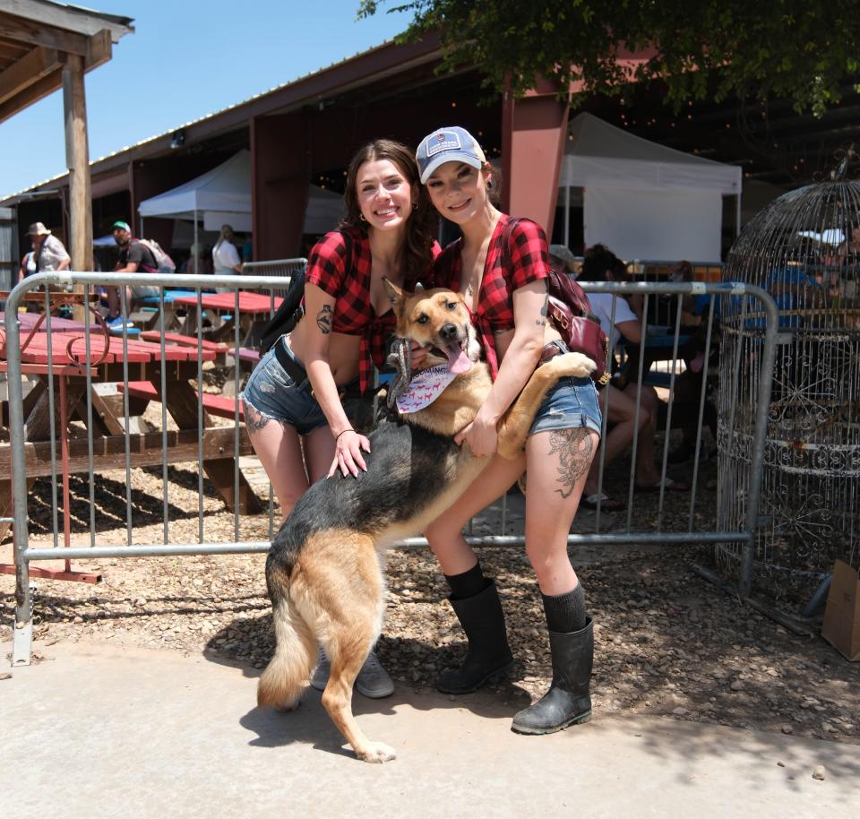 Tori and Kyleigh with their German Shepard Kelso Sunday at the 30th annual Muttfest at the Starlight Ranch Event Center in Amarillo.