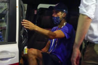 Novak Djokovic, of Serbia, departs the Ariake Tennis Center after his loss to Pablo Carreno Busta, of Spain, in the bronze medal match of the men's singles tennis competition at the 2020 Summer Olympics, Saturday, July 31, 2021, in Tokyo, Japan. (AP Photo/Patrick Semansky)