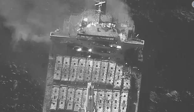 This black-and-white image released by the U.S. military's Central Command shows the fire aboard the bulk carrier True Confidence after a missile attack by Yemen's Houthi rebels in the Gulf of Aden on Wednesday, March 6, 2024. A missile attack by Yemen's Houthi rebels on a commercial ship in the Gulf of Aden on Wednesday killed three of its crew members and forced survivors to abandon the vessel, the U.S. military said. It was the first fatal strike in a campaign of assaults by the Iranian-backed group over Israel's war on Hamas in the Gaza Strip. (U.S. Central Command via AP)