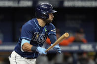 Tampa Bay Rays' Kevin Kiermaier follows through on an RBI single off Detroit Tigers starting pitcher Beau Brieske during the fourth inning of a baseball game Tuesday, May 17, 2022, in St. Petersburg, Fla. Rays' Randy Arozarena scored on the hit. (AP Photo/Chris O'Meara)