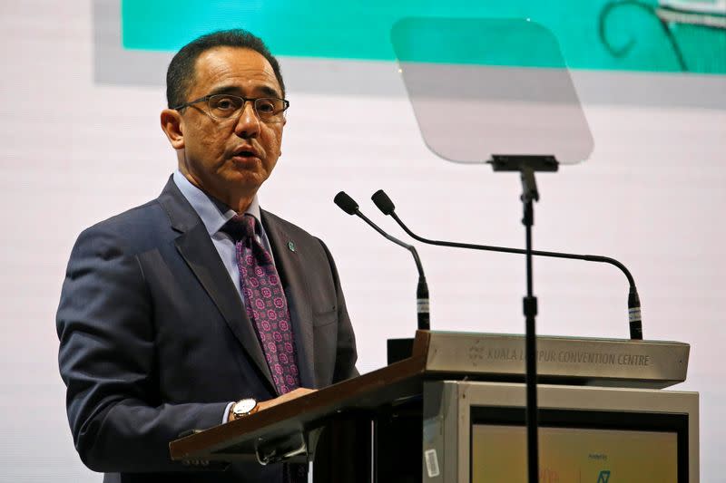 FILE PHOTO: Petronas CEO Wan Zulkiflee Wan Ariffin speaks during the opening ceremony of the 20th Asia Oil & Gas Conference in Kuala Lumpur