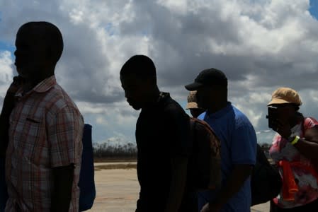 Abaco residents are evacuated from the island at the airport in the wake of Hurricane Dorian in Marsh Harbour