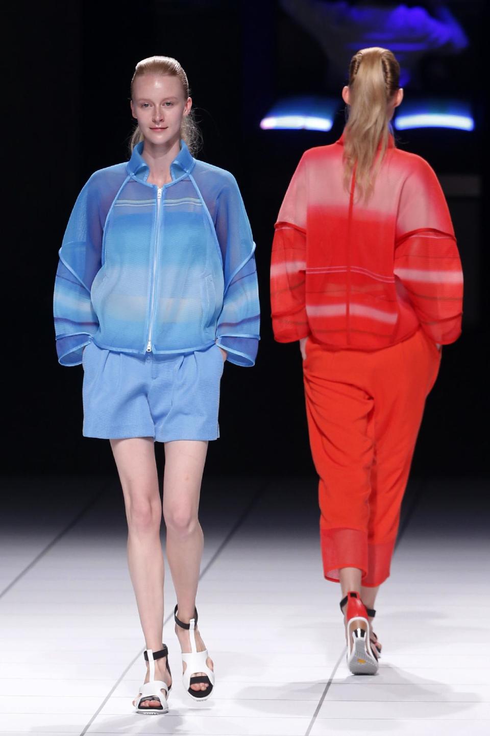 Models present creations as part of Issey Miyake's ready-to-wear Spring/Summer 2014 fashion collection, presented Friday, Sept. 27, 2013 in Paris. (AP Photo/Jacques Brinon)