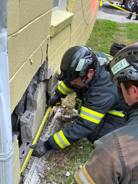 Car strikes building on Wellons St. (Courtesy: Suffolk Department of Fire and Rescue)