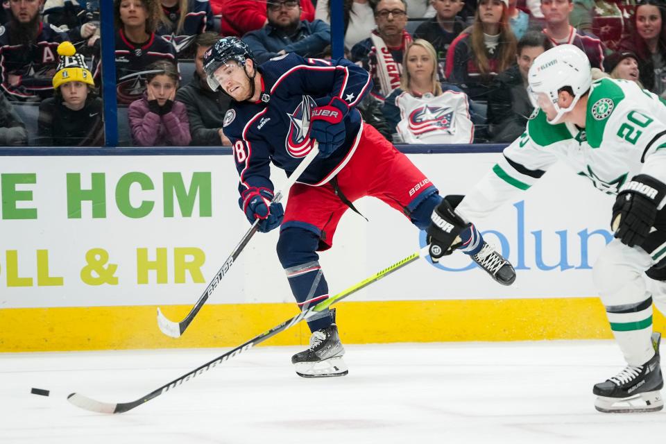 Nov 9, 2023; Columbus, Ohio, USA; Columbus Blue Jackets defenseman Damon Severson (78) fires a shot past Dallas Stars defenseman Ryan Suter (20) during the first period of the NHL hockey game at Nationwide Arena.