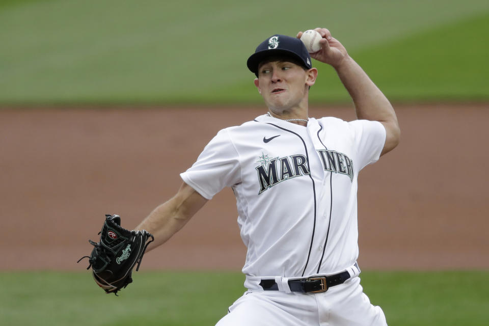 Seattle Mariners starting pitcher Nick Margevicius throws to a Colorado Rockies batter during the first inning of a baseball game Saturday, Aug. 8, 2020, in Seattle. (AP Photo/Elaine Thompson)