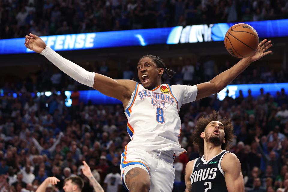 DALLAS, TEXAS - MAY 13: Jalen Williams #8 of the Oklahoma City Thunder drives against Dereck Lively II #2 of the Dallas Mavericks during the fourth quarter in Game Four of the Western Conference Second Round Playoffs at American Airlines Center on May 13, 2024 in Dallas, Texas.