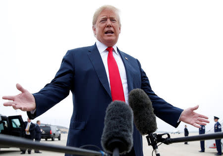 U.S. President Donald Trump talks to reporters prior to departing Washington en route Houston, Texas from Joint Base Andrews, Maryland, U.S., May 31, 2018. REUTERS/Joshua Roberts