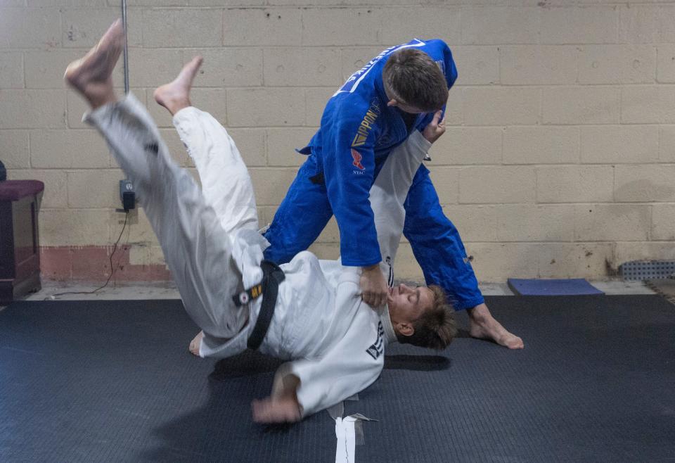 Nick Jr.and brother Jack work out in their basement. The Yonezuka family, who are all outstanding in Judo, at their West Long Branch home on August 30, 2022.