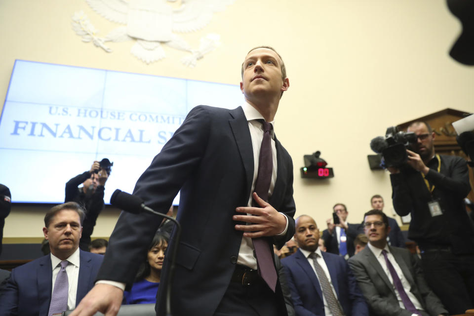 Facebook CEO Mark Zuckerberg arrives to testify before a House Financial Services Committee hearing on Capitol Hill in Washington, Wednesday, Oct. 23, 2019, on Facebook's impact on the financial services and housing sectors. (AP Photo/Andrew Harnik)