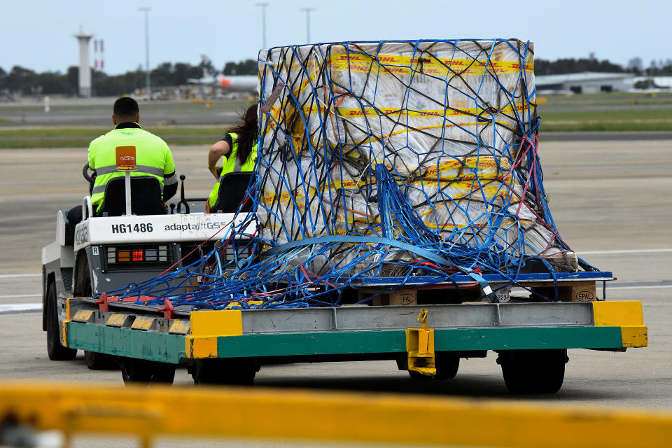 The first Australian shipment of Pfizer Covid-19 vaccines is seen being transported off the tarmac after landing at Sydney International Airport on Monday, February 15, 2021.