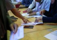 An Iranian man votes during the presidential election in Tehran, Iran, May 19, 2017. TIMA via REUTERS