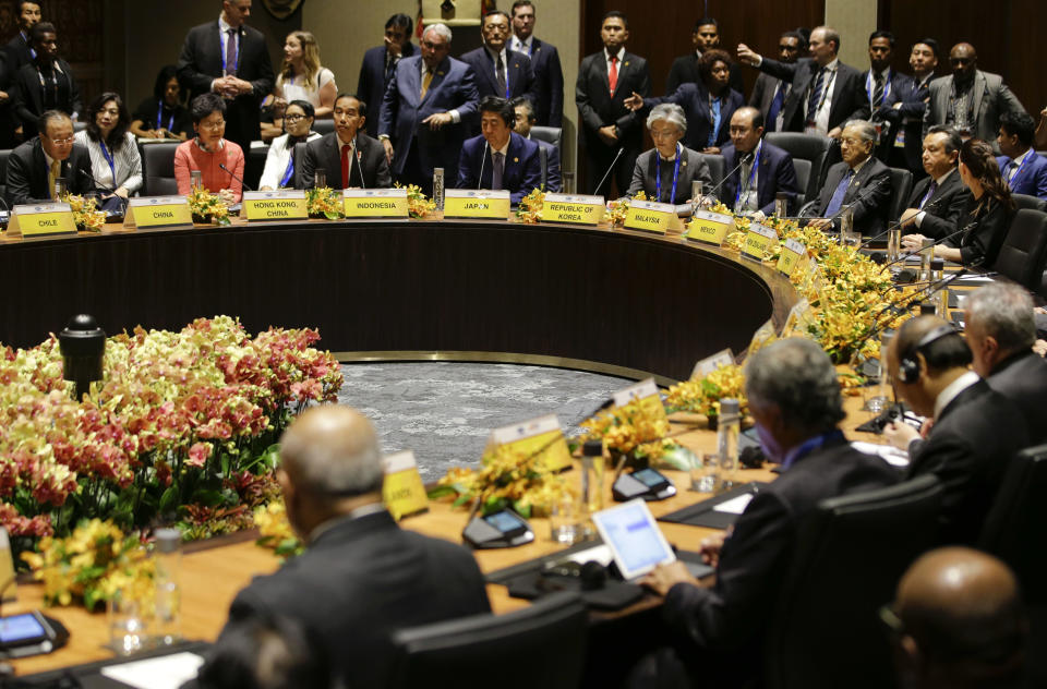 FILE - In this Nov. 17, 2018, file photo, leaders listen during the Pacific Islands Countries Informal Dialogue with APEC Leaders in Port Moresby, Papua New Guinea. New Zealand on Tuesday, June 30, 2020, canceled its plans to host a major meeting of U.S. and Asian leaders next year because of the coronavirus, opting instead to lead a virtual summit. (AP Photo/Aaron Favila)