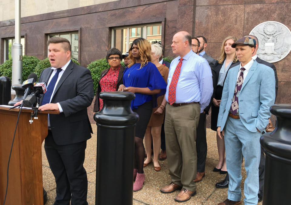 Lambda Legal attorney Omar Gonzalez-Pagan speaks at a news conference outside the federal courthouse in Nashville, Tenn., Tuesday, April 23, 2019. He announced a lawsuit challenging a Tennessee statute that prohibits transgender people from changing the gender listed on their birth certificates. (AP Photo/Travis Loller)