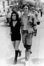 FILE - In this May 5, 1971 photo, musician John Lennon and his wife Yoko Ono walk on the Croisette in Cannes, France, where they are presenting their films "Apothesis" and " The Fly" at the 25th Cannes International Film Festival. An album, "Gimme Some Truth" by John Lennon, will be released Friday, on what would have been his 80th birthday. (AP Photo/Michel Lipchitz, File)