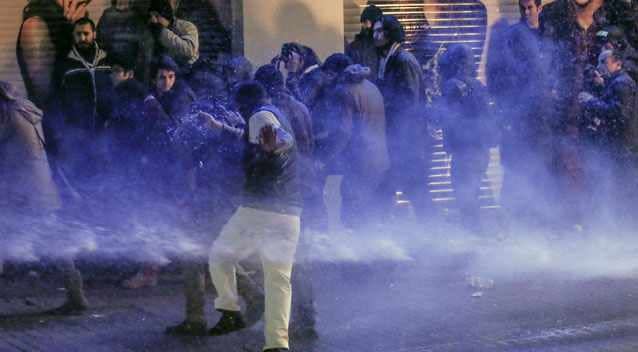 Riot police use a water cannon to disperse protesters during a rally against a bill which would, among other things, allow Turkey's authorities to block web pages for privacy violations without a prior court decision, in Istanbul, Turkey, late Saturday, Feb. 22, 2014. Photo: Getty